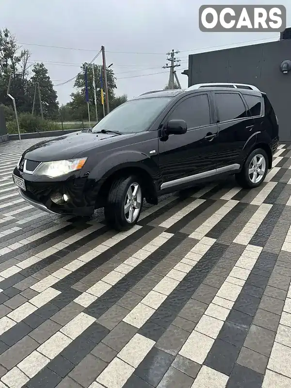 Внедорожник / Кроссовер Mitsubishi Outlander XL 2008 2.4 л. Ручная / Механика обл. Львовская, Городок - Фото 1/17