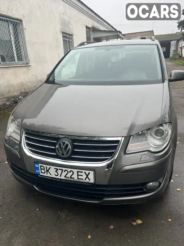 Мінівен Volkswagen Touran 2009 1.39 л. Ручна / Механіка обл. Рівненська, Дубровиця - Фото 1/21