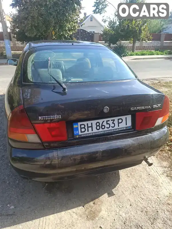 XMCLRDA1ATF013767 Mitsubishi Carisma 1996 Ліфтбек 1.6 л. Фото 5