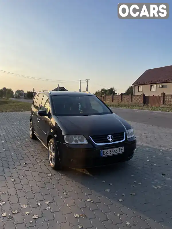 Мінівен Volkswagen Touran 2003 1.97 л. Ручна / Механіка обл. Рівненська, Костопіль - Фото 1/14