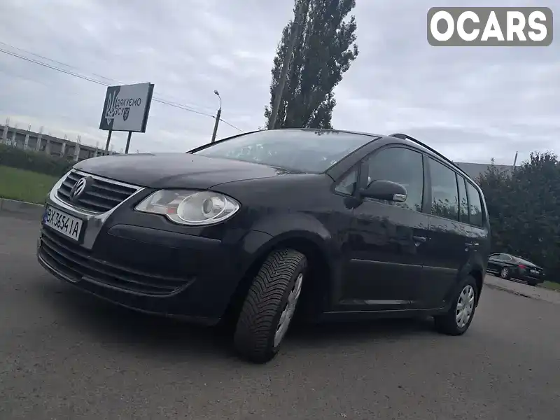 Мінівен Volkswagen Touran 2007 1.6 л. Ручна / Механіка обл. Хмельницька, Хмельницький - Фото 1/21