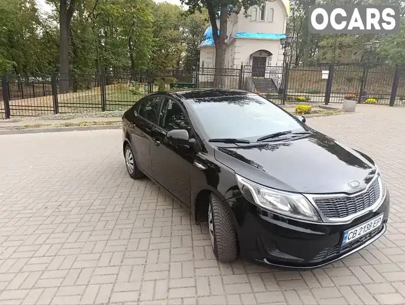 Седан Kia Rio 2013 1.4 л. Автомат обл. Чернігівська, Прилуки - Фото 1/14