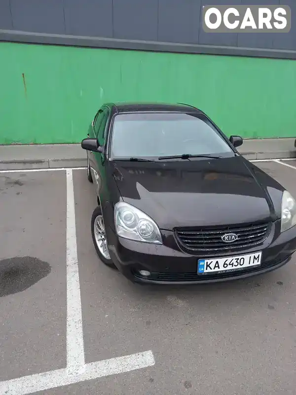 Седан Kia Magentis 2008 2 л. Автомат обл. Київська, Вишневе - Фото 1/21