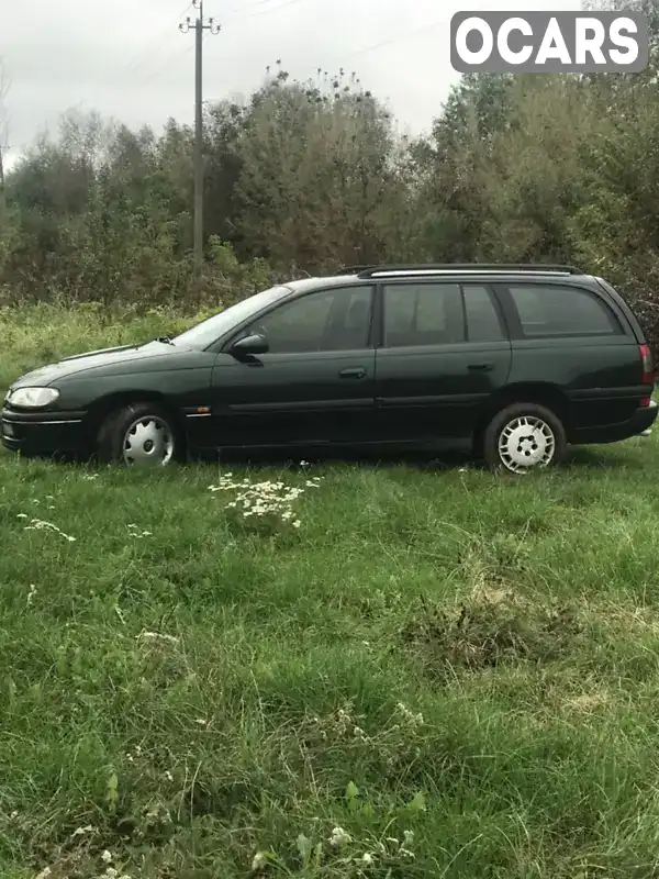 W0L000022S1117415 Opel Omega 1995 Універсал 2 л. Фото 9