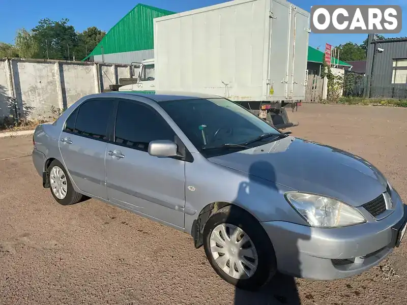 Седан Mitsubishi Lancer 2008 1.6 л. Ручна / Механіка обл. Чернігівська, Чернігів - Фото 1/13