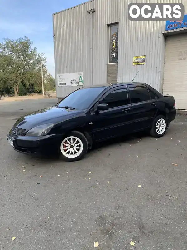 Седан Mitsubishi Lancer 2006 1.58 л. Ручна / Механіка обл. Дніпропетровська, Кам'янське (Дніпродзержинськ) - Фото 1/13