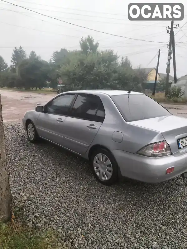 Седан Mitsubishi Lancer 2006 1.6 л. Ручна / Механіка обл. Житомирська, Попільня - Фото 1/4