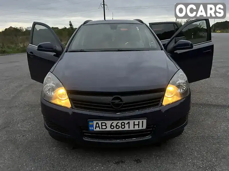 W0L0AHL35A2093860 Opel Astra 2010 Універсал 1.69 л. Фото 2