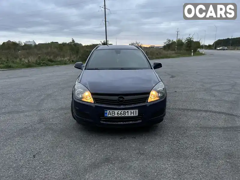 W0L0AHL35A2093860 Opel Astra 2010 Універсал 1.69 л. Фото 5