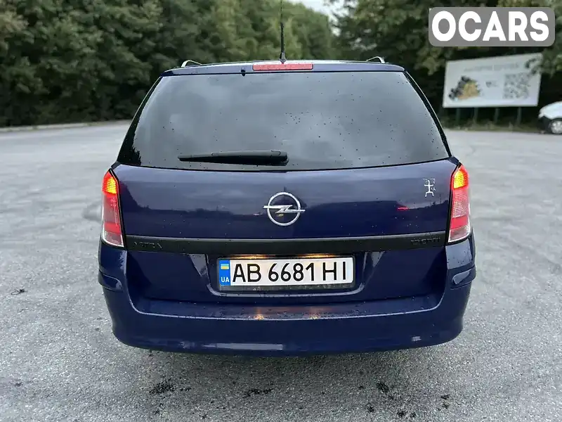 W0L0AHL35A2093860 Opel Astra 2010 Універсал 1.69 л. Фото 8