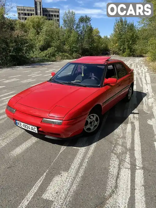 Хэтчбек Mazda 323 1994 1.6 л. Ручная / Механика обл. Днепропетровская, Днепр (Днепропетровск) - Фото 1/14