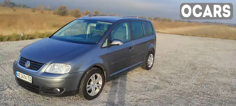 Мінівен Volkswagen Touran 2006 1.39 л. Ручна / Механіка обл. Дніпропетровська, Дніпро (Дніпропетровськ) - Фото 1/10