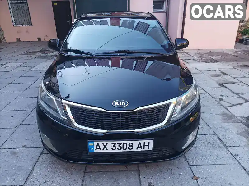 Седан Kia Rio 2013 1.4 л. Ручна / Механіка обл. Тернопільська, Кременець - Фото 1/21