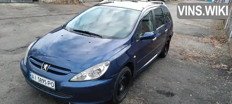 Універсал Peugeot 307 2003 2 л. Ручна / Механіка обл. Київська, Вишневе - Фото 1/21