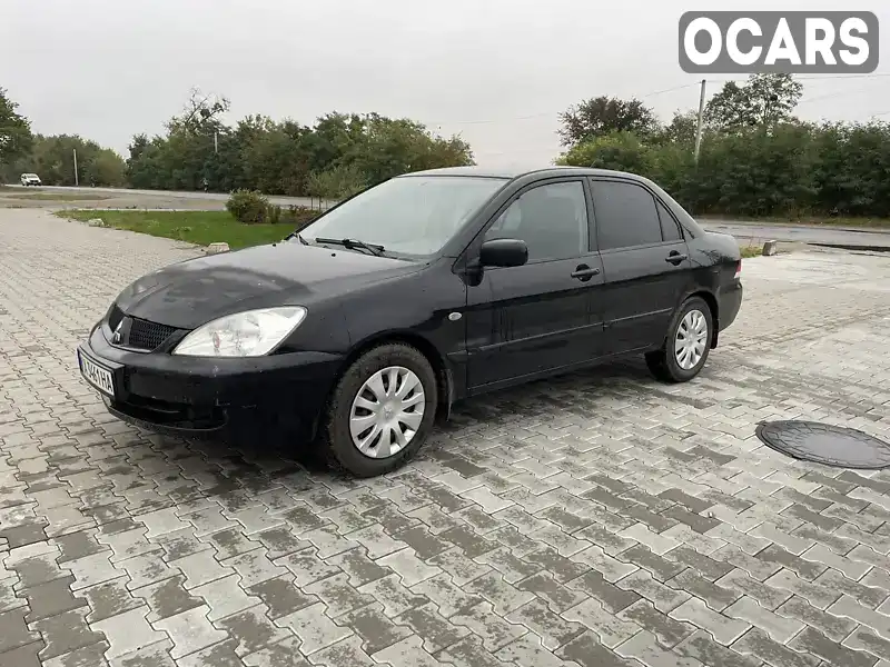 Седан Mitsubishi Lancer 2008 1.59 л. Ручна / Механіка обл. Київська, Бородянка - Фото 1/21