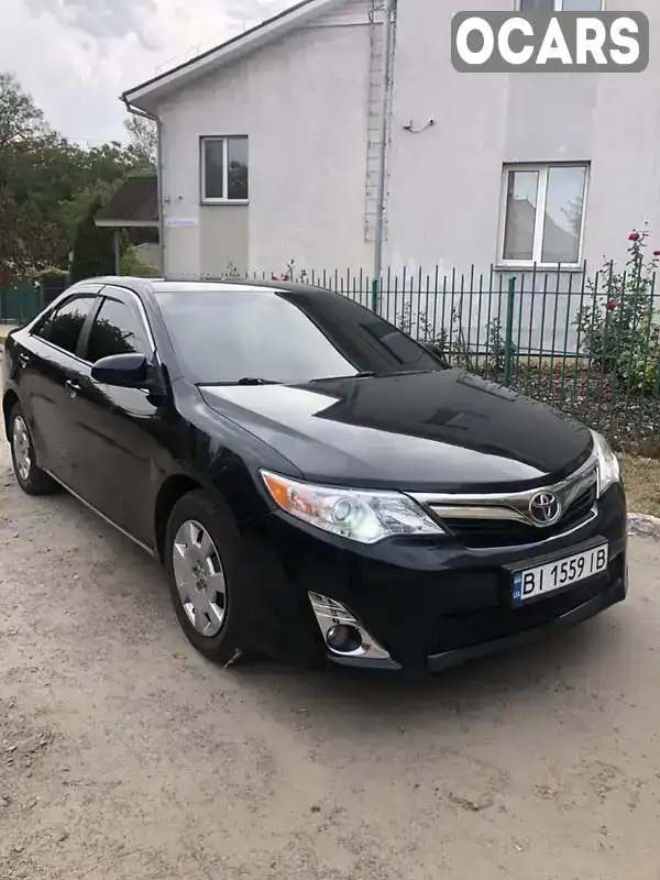 Седан Toyota Camry 2012 2.49 л. Автомат обл. Полтавська, Полтава - Фото 1/6