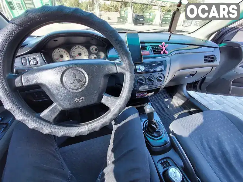 Седан Mitsubishi Lancer 2005 1.58 л. Ручна / Механіка обл. Кіровоградська, Кропивницький (Кіровоград) - Фото 1/13