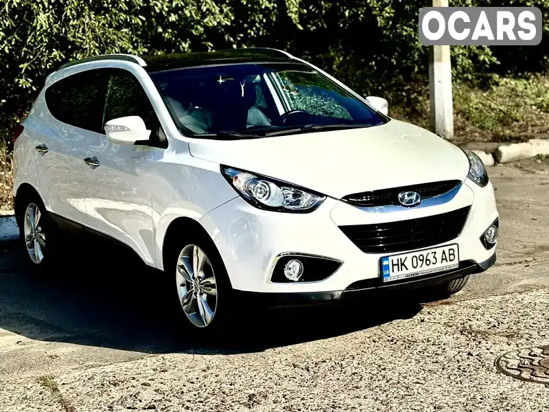 Внедорожник / Кроссовер Hyundai ix35 2011 2 л. Автомат обл. Ровенская, Ровно - Фото 1/21