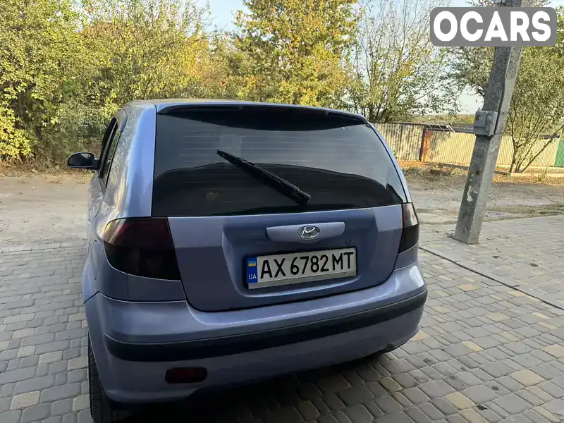 KMHBT51HP4U187355 Hyundai Getz 2004 Хетчбек 1.3 л. Фото 4