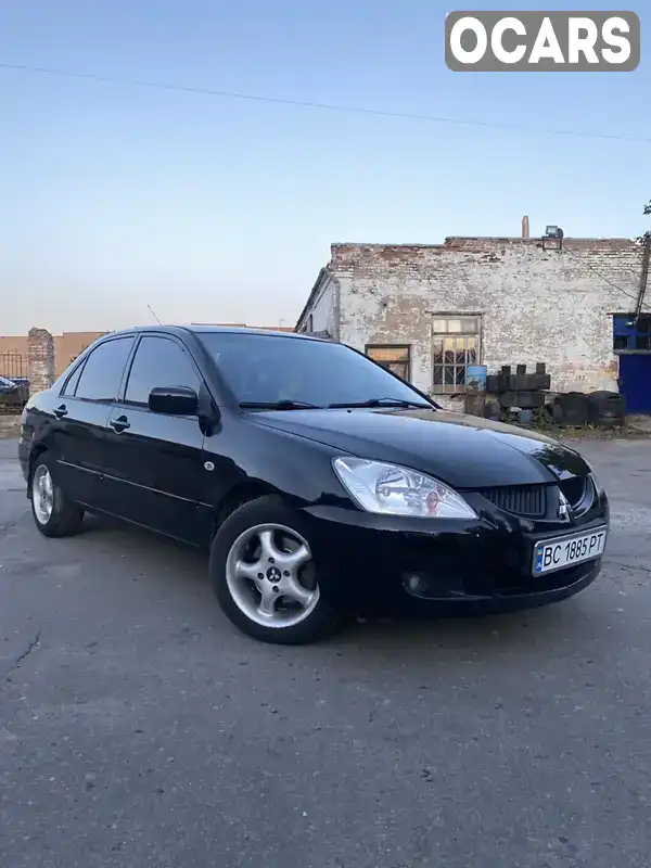 Седан Mitsubishi Lancer 2004 1.6 л. Ручная / Механика обл. Львовская, Львов - Фото 1/21