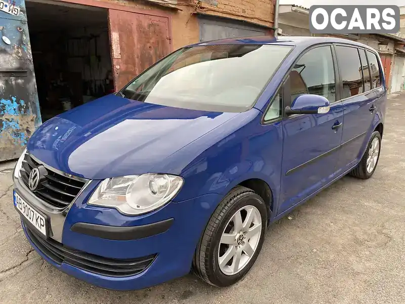 Минивэн Volkswagen Touran 2009 1.6 л. Ручная / Механика обл. Черкасская, Христиновка - Фото 1/21