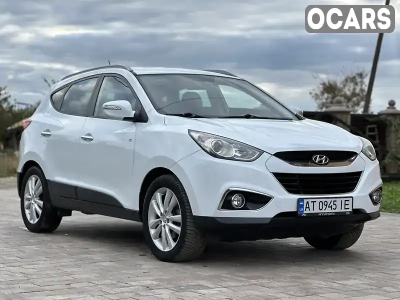 Внедорожник / Кроссовер Hyundai ix35 2010 2 л. Автомат обл. Ивано-Франковская, Снятин - Фото 1/21