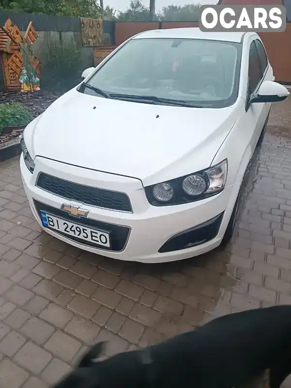 Седан Chevrolet Aveo 2014 1.4 л. Автомат обл. Полтавская, Лубны - Фото 1/21