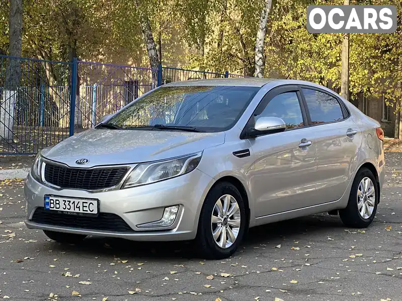 Седан Kia Rio 2013 1.59 л. Ручна / Механіка обл. Харківська, Харків - Фото 1/21