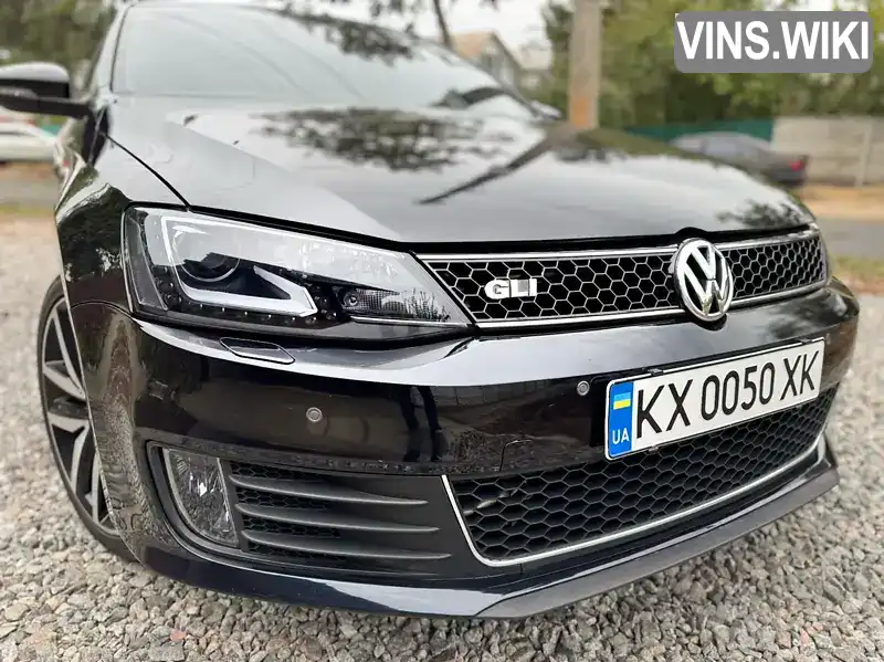 Седан Volkswagen Jetta 2013 2 л. Автомат обл. Харьковская, Харьков - Фото 1/21