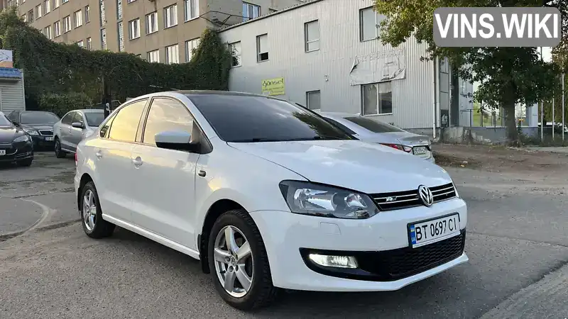 Седан Volkswagen Polo 2013 1.6 л. Автомат обл. Миколаївська, Миколаїв - Фото 1/16