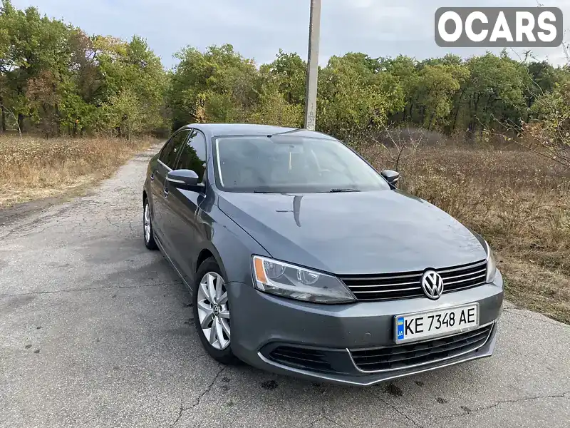 Седан Volkswagen Jetta 2014 1.8 л. обл. Дніпропетровська, Новомосковськ - Фото 1/12