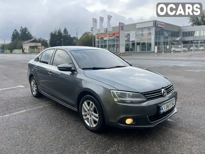 Седан Volkswagen Jetta 2011 1.6 л. Автомат обл. Київська, Буча - Фото 1/10