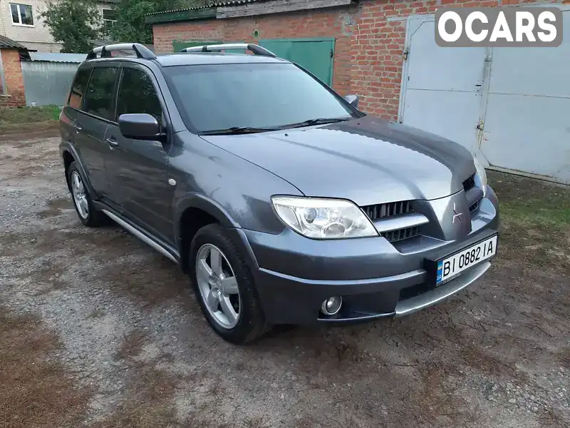 Позашляховик / Кросовер Mitsubishi Outlander 2007 2.38 л. Автомат обл. Полтавська, Хорол - Фото 1/21