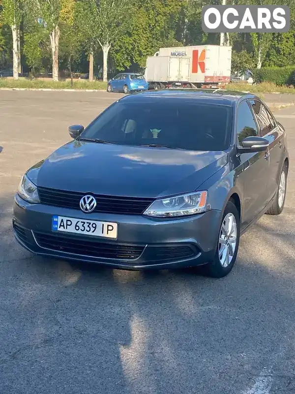 Седан Volkswagen Jetta 2013 2.48 л. Автомат обл. Запорізька, Запоріжжя - Фото 1/12