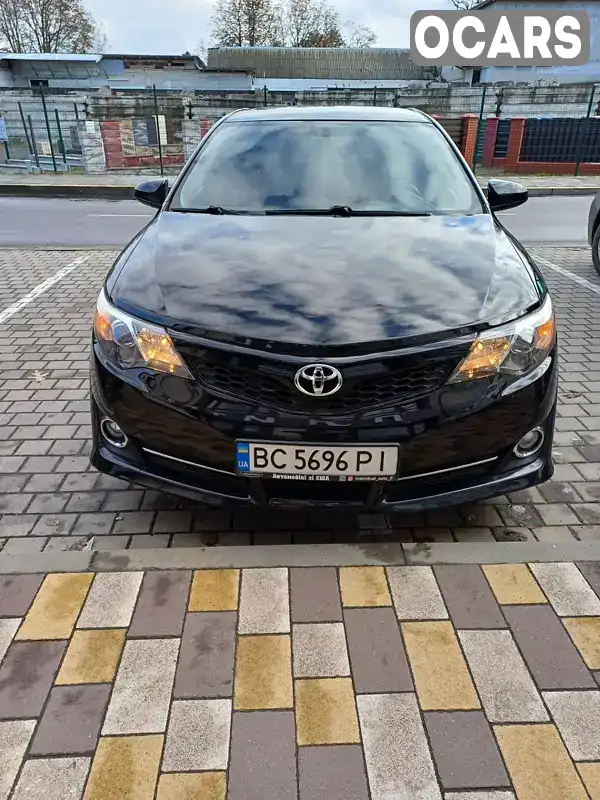 Седан Toyota Camry 2014 2.49 л. Автомат обл. Львівська, Стрий - Фото 1/21