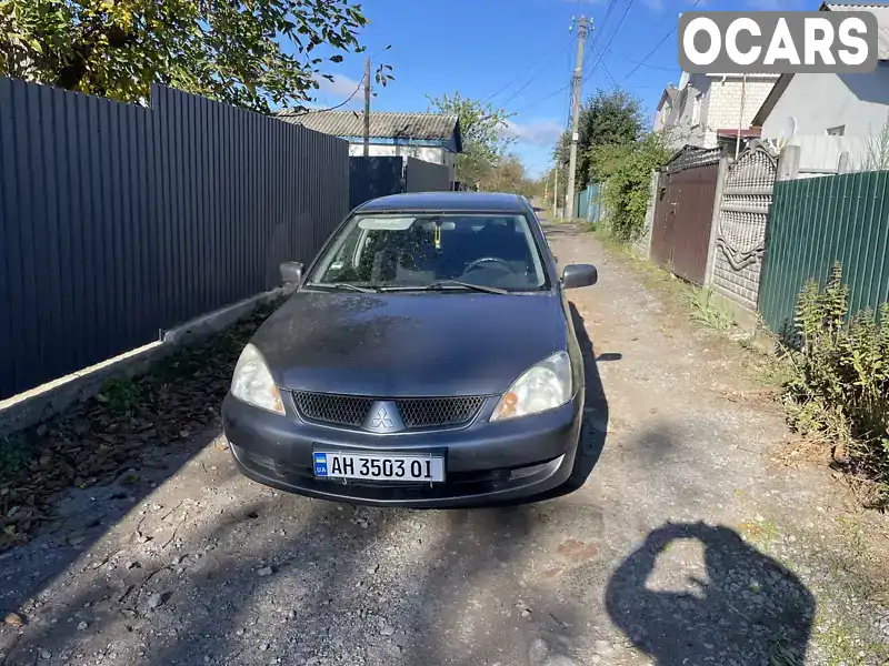 JMBSNCS3A6U004408 Mitsubishi Lancer 2005 Седан 1.58 л. Фото 1