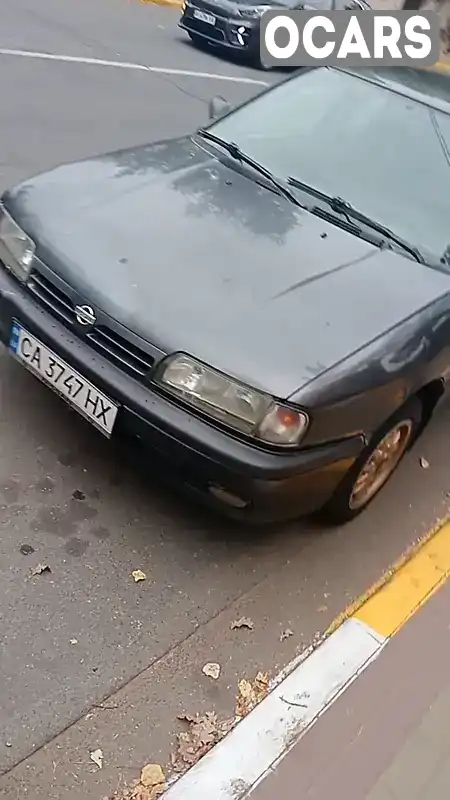 Седан Nissan Primera 1991 1.6 л. Ручна / Механіка обл. Київська, Київ - Фото 1/21