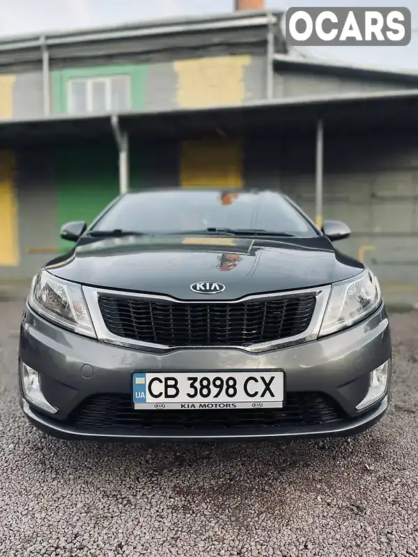 Седан Kia Rio 2013 1.6 л. Ручна / Механіка обл. Чернігівська, Прилуки - Фото 1/21