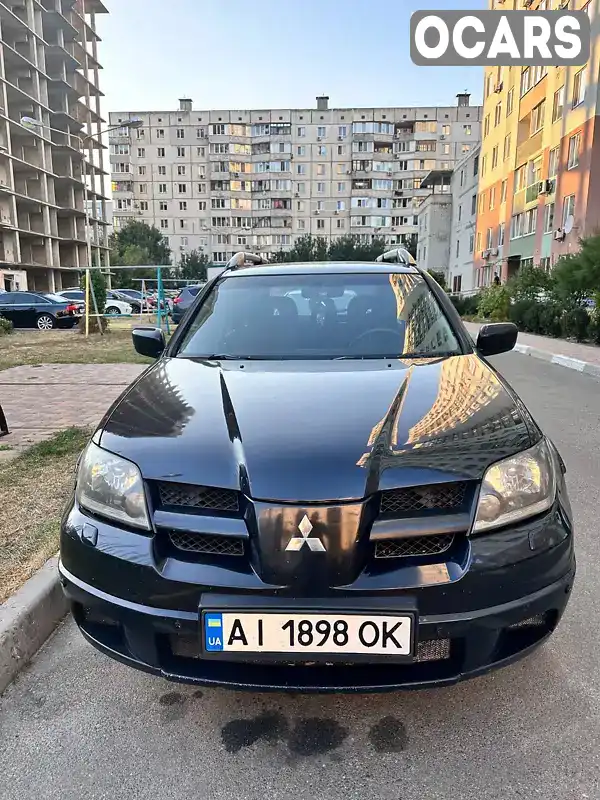 Позашляховик / Кросовер Mitsubishi Outlander 2007 2.38 л. Автомат обл. Київська, Обухів - Фото 1/8