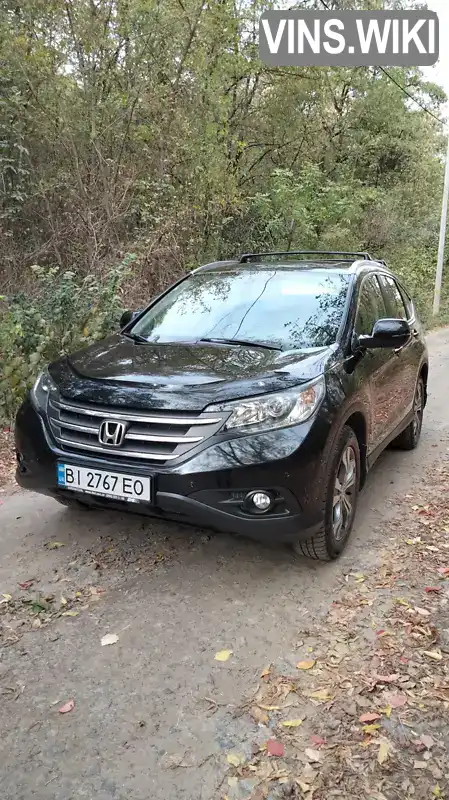 Внедорожник / Кроссовер Honda CR-V 2013 2.35 л. Автомат обл. Полтавская, Полтава - Фото 1/21