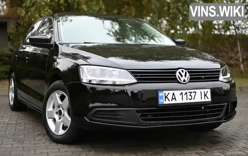 Седан Volkswagen Jetta 2013 2 л. Автомат обл. Дніпропетровська, Павлоград - Фото 1/21