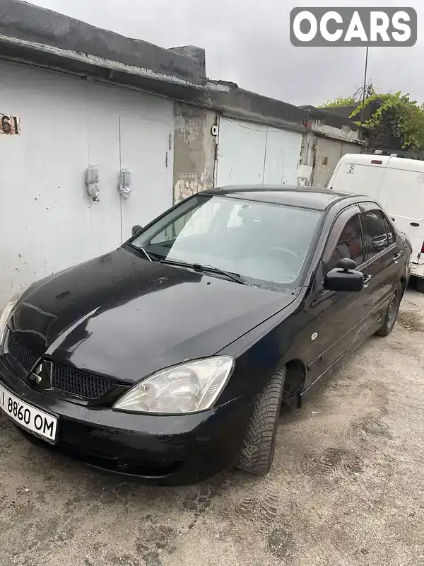 Седан Mitsubishi Lancer 2005 1.58 л. обл. Сумська, Ромни - Фото 1/4