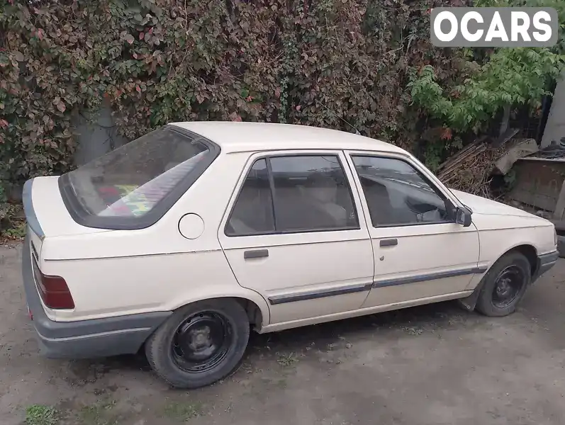 Хетчбек Peugeot 309 1988 1.3 л. Ручна / Механіка обл. Дніпропетровська, Дніпро (Дніпропетровськ) - Фото 1/4