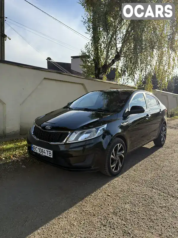 Седан Kia Rio 2014 1.4 л. Автомат обл. Львівська, Львів - Фото 1/21