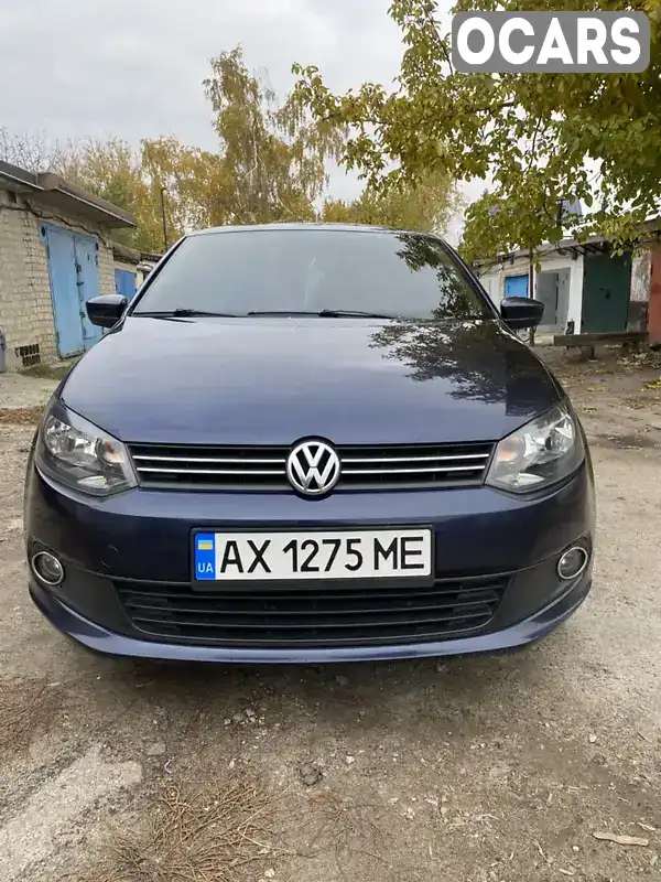 Седан Volkswagen Polo 2014 1.6 л. Ручна / Механіка обл. Харківська, Первомайський - Фото 1/21