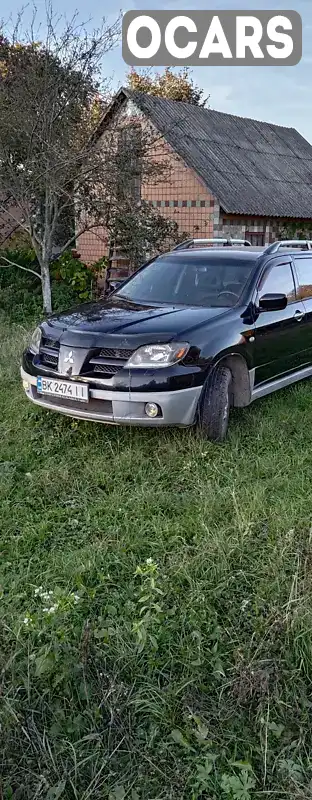 Позашляховик / Кросовер Mitsubishi Outlander 2003 2.4 л. Автомат обл. Рівненська, location.city.mizoch - Фото 1/21