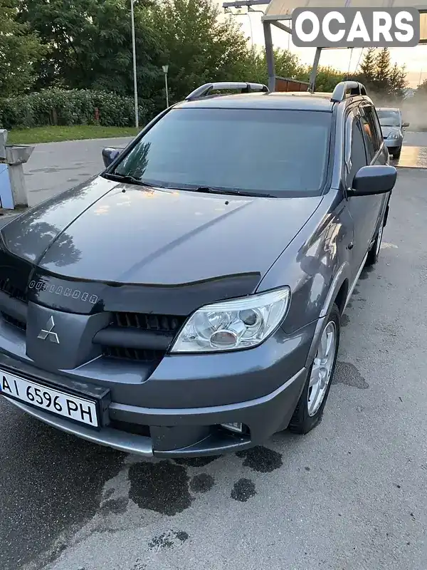 Внедорожник / Кроссовер Mitsubishi Outlander 2005 2.4 л. Автомат обл. Житомирская, Бердичев - Фото 1/10