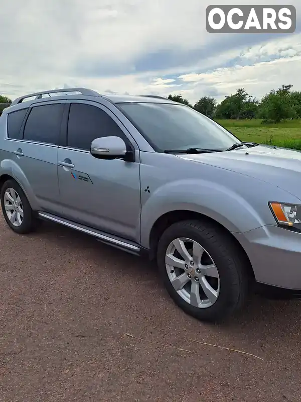 Позашляховик / Кросовер Mitsubishi Outlander 2009 2.2 л. Ручна / Механіка обл. Чернігівська, Новгород-Сіверський - Фото 1/14