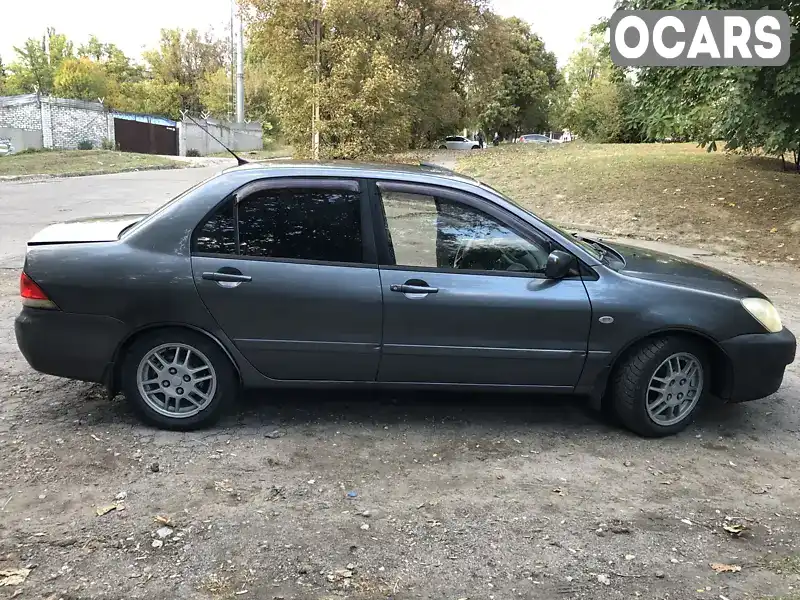 Седан Mitsubishi Lancer 2005 1.6 л. Ручна / Механіка обл. Дніпропетровська, Кам'янське (Дніпродзержинськ) - Фото 1/10