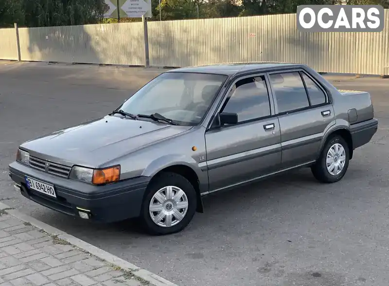 Седан Nissan Sunny 1990 1.4 л. Ручная / Механика обл. Полтавская, Кременчуг - Фото 1/9